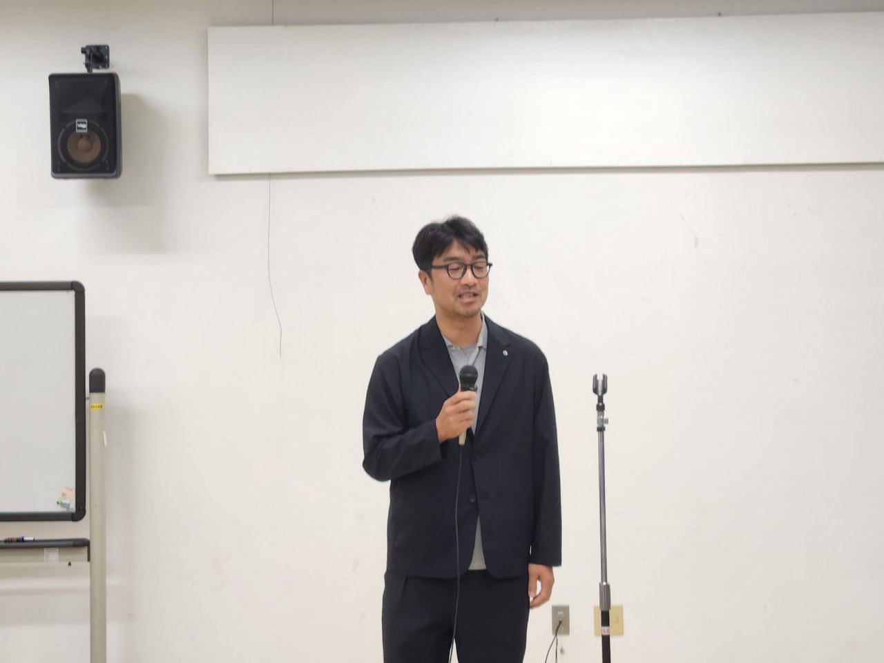 主催者あいさつをする深谷商工会議所青年部 岡田高和会長